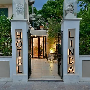 & Linda Italie